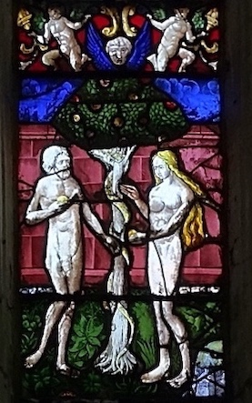 Le serpent tend la pomme à Éve.<br>Eglise Saint Florentin - Saint-Florentin 89