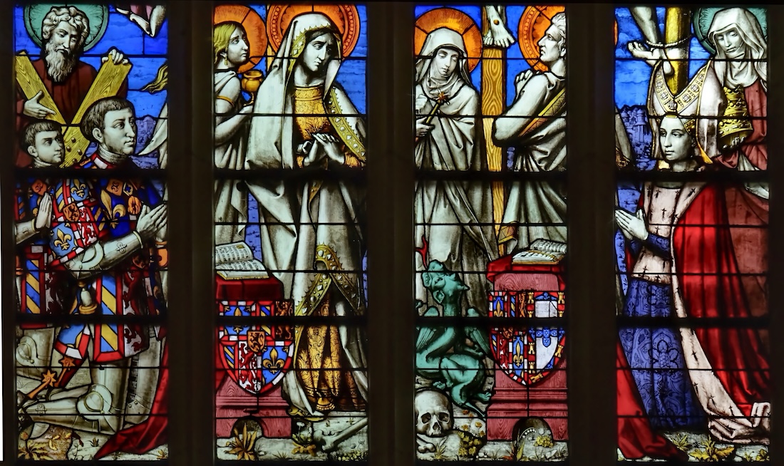 Philippe le Bon, due de Bourgogne, agenouillé en donateur, derrière lui : son fils le futur Charles le Téméraire, présentés par saint André,
						<br>en face : Isabelle de Portugal, la duchesse de Bourgogne et sainte Elisabeth de Hongrie
						<br> au centre au pied de la croix : saint Jean, la Vierge, sainte Marthe et sainte Marie-Madeleine