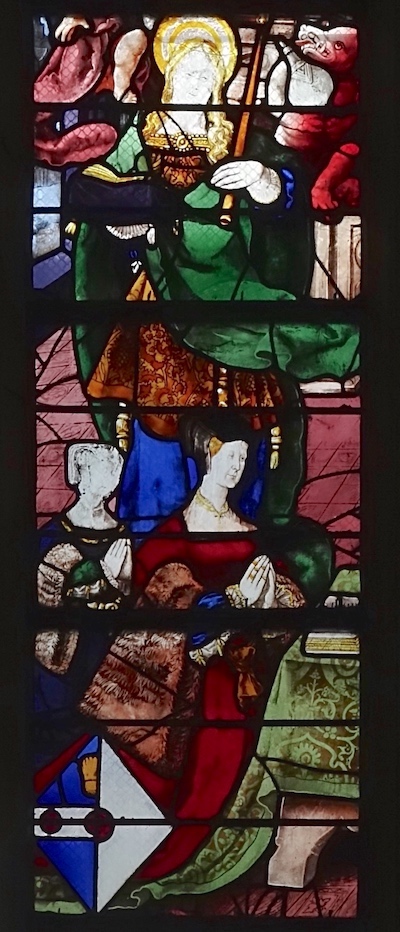 [6] Geneviève Le Pelletier et sa fille présentées par sainte Geneviève. Sainte Geneviève tient un cierge de sa main gauche surlequel souffle un diable pour l'éteindre.