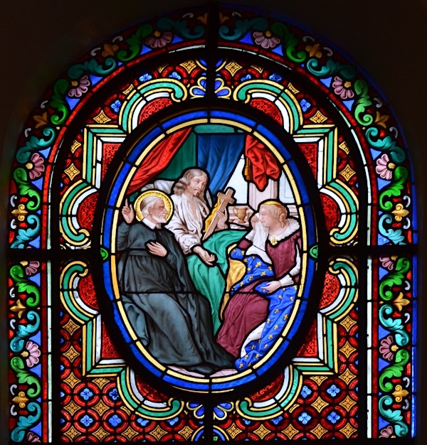 Saint Vincent de Paul, assis près roi du Louis XIII allité et de la reine, Anne d'Autriche